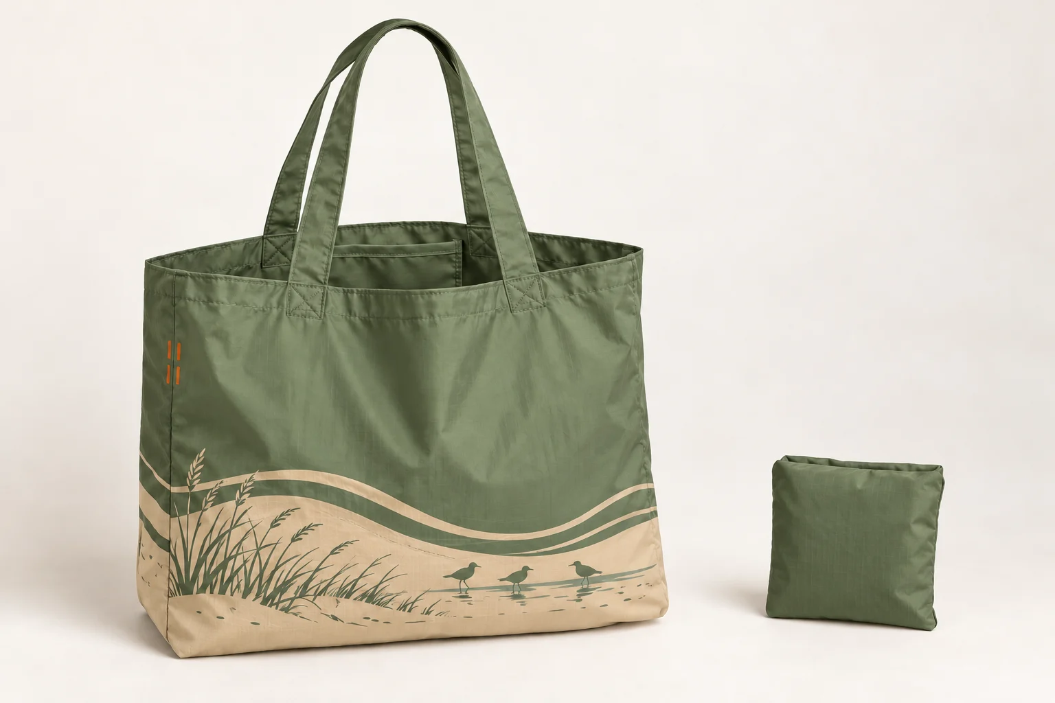 Green tote shown open and folded into its attached pocket